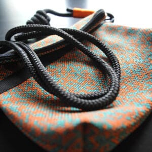 BOLSA PEQUEÑA NARANJA-TURQUESA