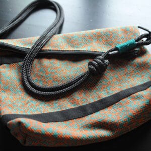 BOLSA MEDIA NARANJA-TURQUESA